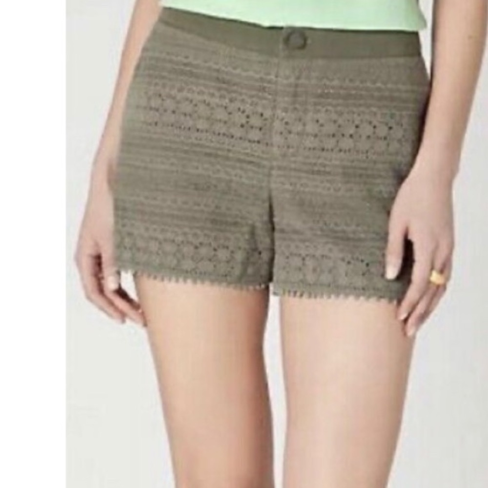 Anthropologie Daughters of the Liberation green shorts with crochet overlay